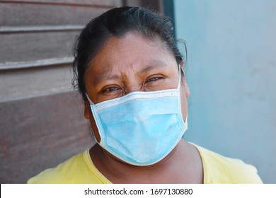 Native American Woman Wearing Mask.