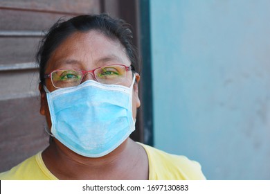 Native American Woman Wearing Mask.