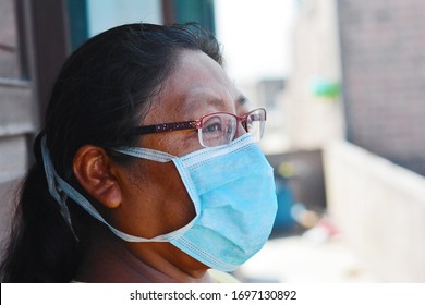 Native American Woman Wearing Mask.