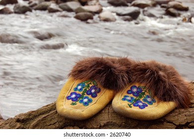 Native Moccasin By Water