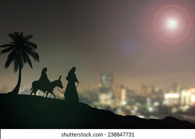 Nativity Christmas Concept: Mary And Joseph With A Donkey