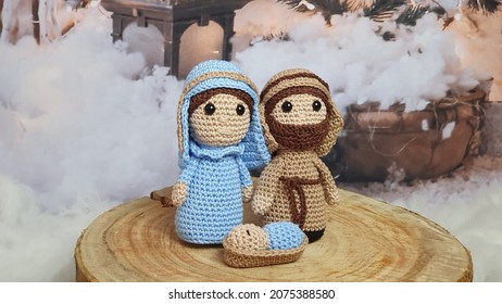 Nativity of Jesus. Christmas scene with dolls representing the baby Jesus Christ in the manger and Mary and Joseph.
 - Powered by Shutterstock