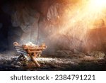 Nativity - Waiting Birth Of Jesus Christ With Manger In Cave With Holy Light And Abstract Defocused Bokeh