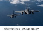 NATO exercise Ramstein Flag 24, flies in formation with a Portuguese Air Force F-16 Fighting Falcon over the west coast of Greece, Oct. 4, 2024