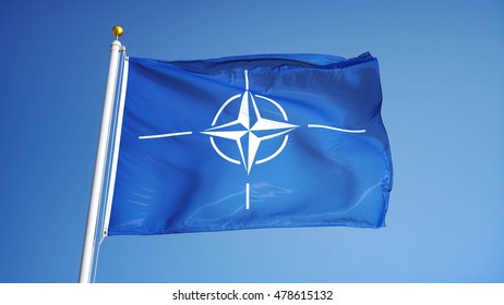 NATO Flag Waving Against Clean Blue Sky, Close Up, Isolated With Clipping Path Mask Alpha Channel Transparency