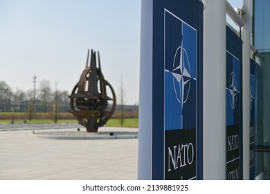 NATO Logo Flags In Front Of The Headquarters Building In Brussels, Belgium, 2022.