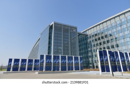 NATO Logo Flags In Front Of The Headquarters Building In Brussels, Belgium, 2022.