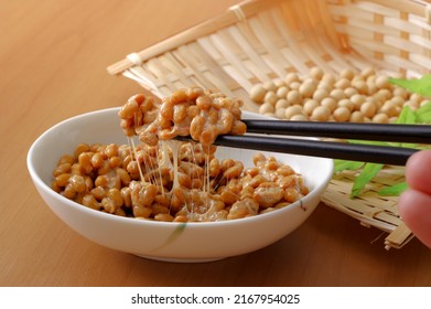 Natto in a small bowl, fermented food - Shutterstock ID 2167954025