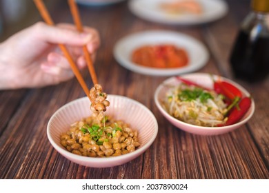 Natto - traditional Japanese food made from soybeans that have been fermented with Bacillus subtilis var. natto. It is often served as a breakfast food. - Shutterstock ID 2037890024