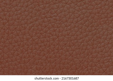 Natural, artificial brown leather texture background. Material for sport items, clothes, furnitre and interior design. ecological friendly leatherette.
