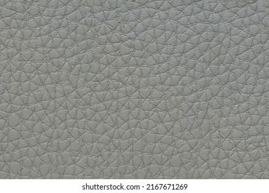Natural, artificial gray leather texture background. Material for sport items, clothes, furnitre and interior design. ecological friendly leatherette.