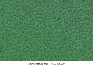 Natural, artificial green leather texture background. Material for sport items, clothes, furnitre and interior design. ecological friendly leatherette.