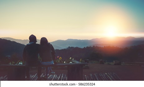 Natural background Couples lovers. The sun rises in the morning on the mountain. - Powered by Shutterstock