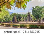 The natural background of the historical tourist attractions in Sukhothai Historical Park, where travelers from all over Europe always come to admire its beauty.