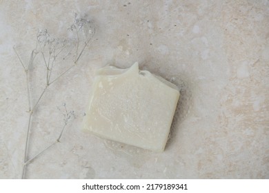 Natural Bar Soap For Healthy Skin And Hair.
Hydrating Cleansing Bar On Stone Textured Plain Background.