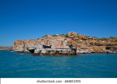 The natural beauty of the coastline of Bigge Island on the Kimberley Coast, Australia. Uninhabited with sandstone rocks, hills and caves lining the coast. 