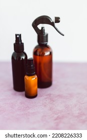 Natural Beauty And Organic Ingredients In Skincare, Apothecary Skincare Bottles And Scent Spray On Pink Background