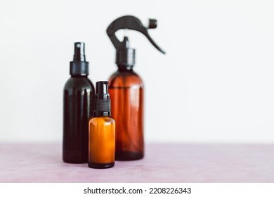 Natural Beauty And Organic Ingredients In Skincare, Apothecary Skincare Bottles And Scent Spray On Pink Background