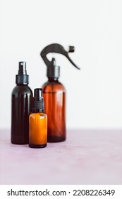 Natural Beauty And Organic Ingredients In Skincare, Apothecary Skincare Bottles And Scent Spray On Pink Background