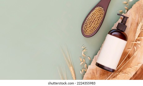 Natural Beauty Product. Mockup. Dispenser Bottle With Beauty Product And Body Wash Brush On A Wooden Podium On A Green Background With Rye And Wheat Ears And Copy Space. Mock Up Of Natural Washing Gel