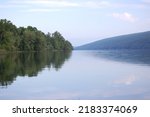 Natural beauty and reflection on Hemlock Lake in NY