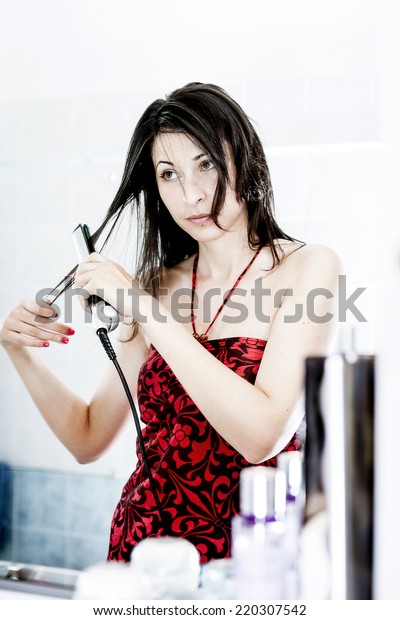 Natural Beauty Straightening Her Long Hair Stock Photo Edit Now
