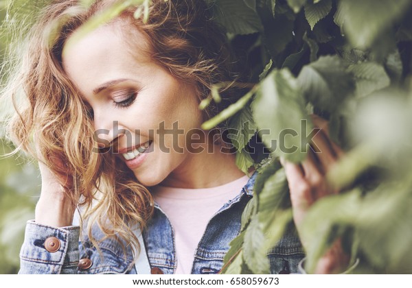 Natural beauty of women between leaves