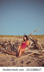 Natural Beauty Young Woman In Retro Swimwear Relaxing At The Beach On Summer Vacation.