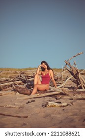 Natural Beauty Young Woman In Retro Swimwear Relaxing At The Beach On Summer Vacation.