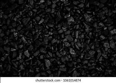 Natural black coals for background. Industrial coals. Volcanic rock energy on earth. - Shutterstock ID 1061014874