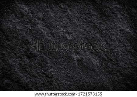 natural black stone texture or dark grey black slate background. abstract black stone pattern.