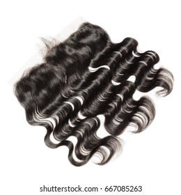 Natural black  virgin remy body wave human hair extensions wide range lace frontal closure  - Shutterstock ID 667085263