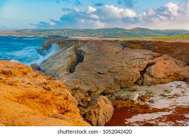 Natural Bridge, Stone Arch Formed By Ocean Waves On The Island Of Aruba