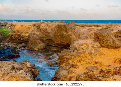 Natural Bridge, Stone Arch Formed By Ocean Waves On The Island Of Aruba