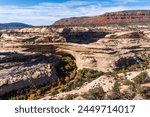 Natural Bridges National Monument in Utah. A natural bridge is formed through erosion by water flowing in the stream bed of the canyon. Kachina Bridge from Bridge View Drive overlook. 