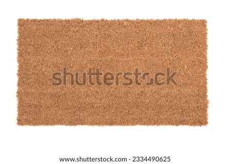 Natural brown coconut fiber doormat. Plain natural dry carpet and dirt outside your entrance, Detail, closeup of fiber and base on white background