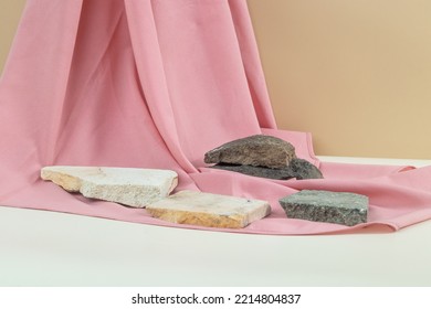 Natural Brown And White Background With Natural Stones And Soft Pink Fabric