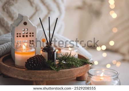 Similar – Image, Stock Photo a burning candle in a dark pub