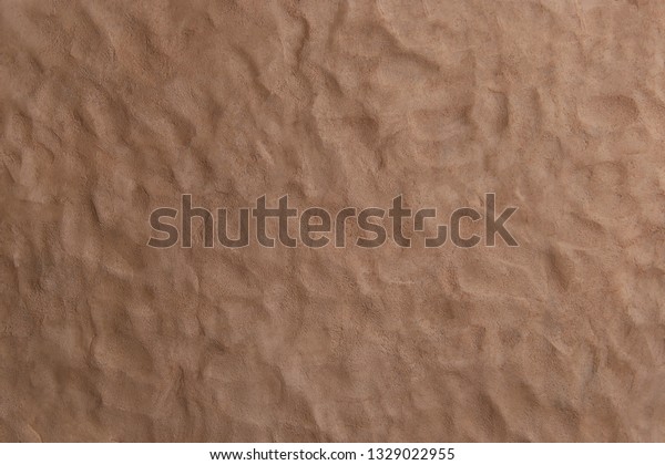 Natural clay texture background. Wet clay
material for craft.
