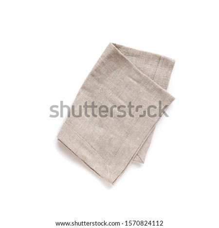 Natural cloth kitchen napkin, linen tablecloth isolated on white background, top view, design element.