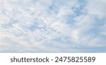 Natural and cloudy fresh blue sky background. Natural sky beautiful blue and white texture background. Blue sky and cloud on summer daytime. Blue sky and white clouds of daytime