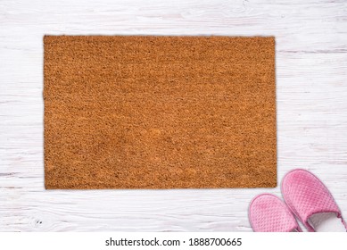 Natural Coir Doormat On Antique Wooden Texture, Background