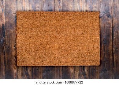 Natural Coir Doormat On Antique Wooden Texture, Background