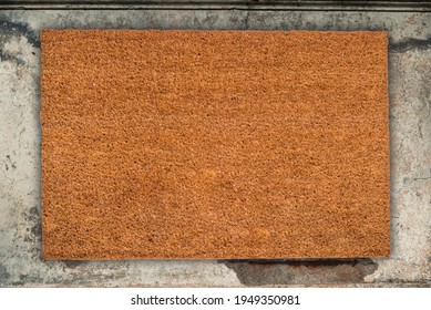 Natural Coir Doormat On Old Stone Floor, Background