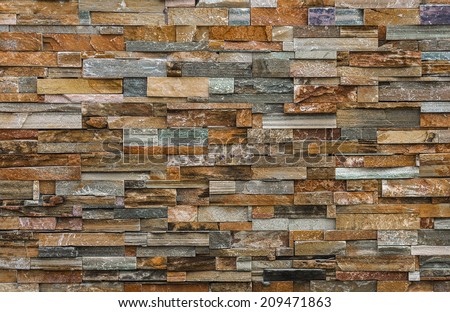 Natural colorful stone wall for background and texture