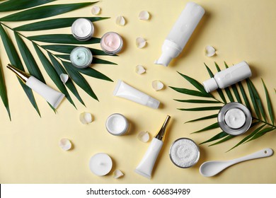 Natural Cosmetics And Leaves On Light Background
