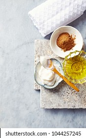 Natural Cosmetics On Gray Stone Background( Face Balm, Argan Oil And Red Clay). Natural And Organic Cosmetics. Spa At Home. Flatlay