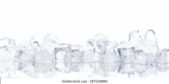 Natural Crystal Clear Melting Ice Cubes On White Reflective Surface Background.