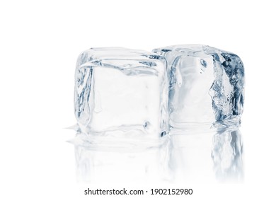 Natural crystal clear melting single ice cubes on white reflective background.