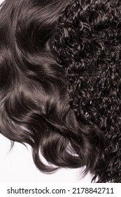 Natural Dark Curly Wavy Female Hair And Straight Dark Hair Isolated On The White Background